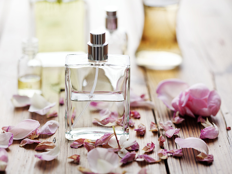 Pefume Bottles With Flower Petals